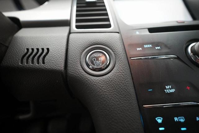 Photo of 2015 Magnetic Metallic Ford Taurus