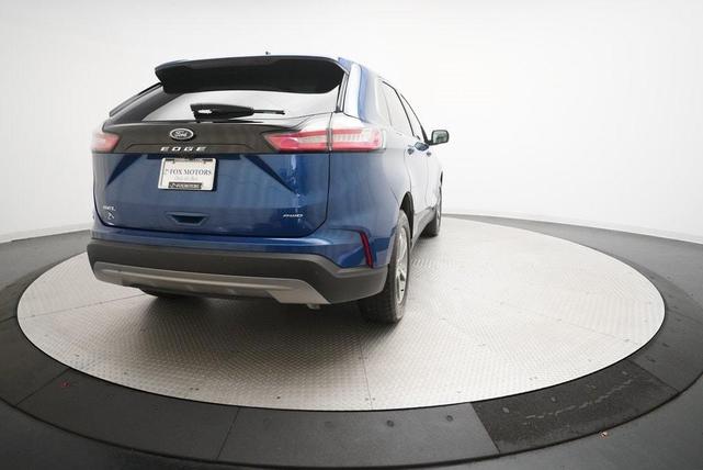 Photo of 2023 Atlas Blue Metallic Ford Edge