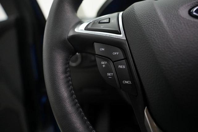 Photo of 2023 Atlas Blue Metallic Ford Edge