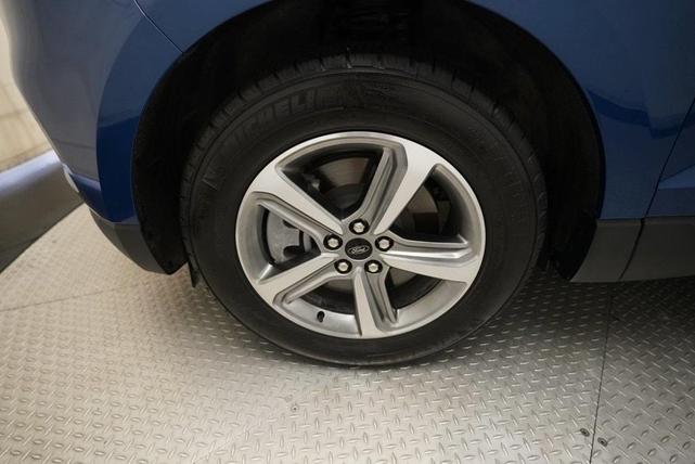 Photo of 2023 Atlas Blue Metallic Ford Edge