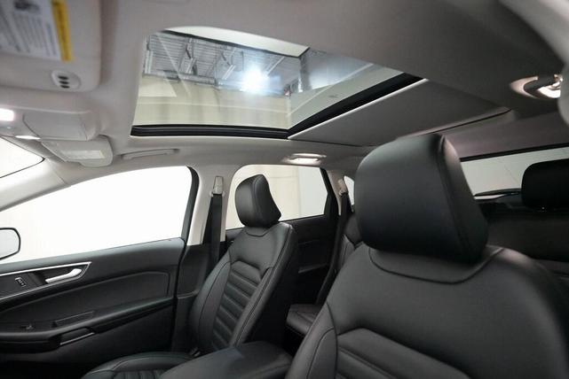 Photo of 2023 Atlas Blue Metallic Ford Edge