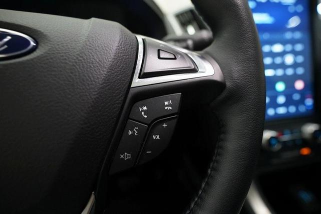 Photo of 2023 Atlas Blue Metallic Ford Edge