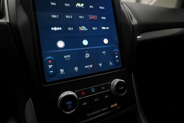 Photo of 2024 Atlas Blue Metallic Ford Edge