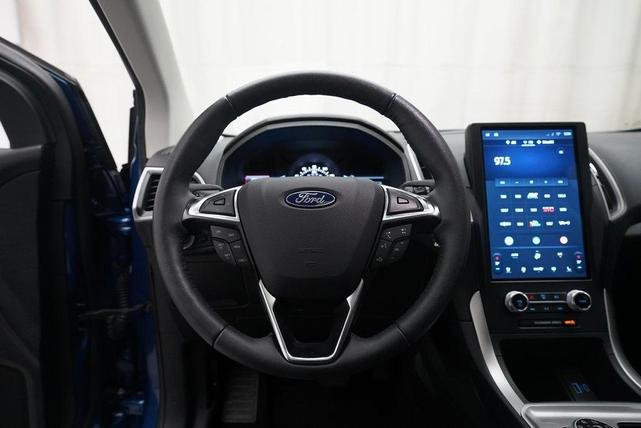 Photo of 2024 Atlas Blue Metallic Ford Edge