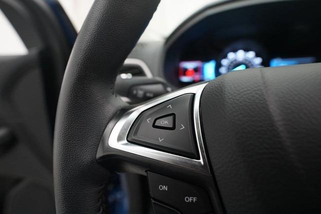 Photo of 2024 Atlas Blue Metallic Ford Edge