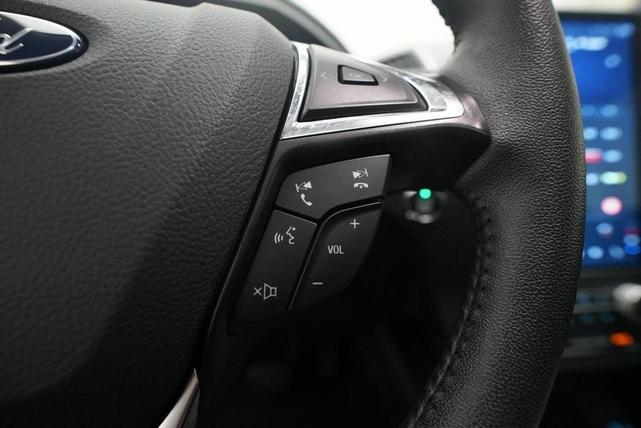 Photo of 2024 Atlas Blue Metallic Ford Edge