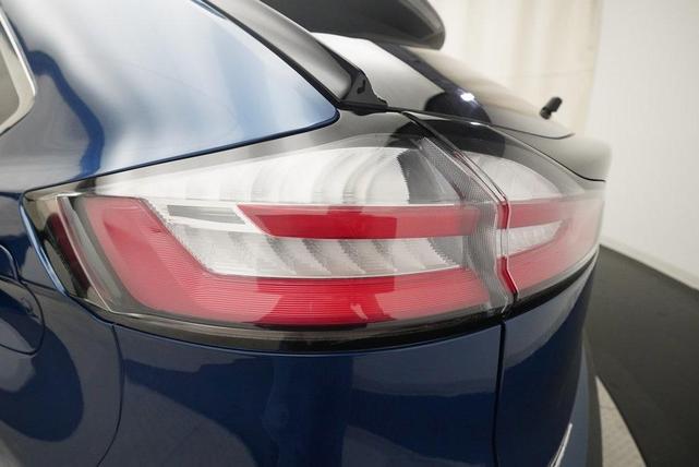 Photo of 2024 Atlas Blue Metallic Ford Edge