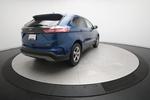 Photo of 2024 Atlas Blue Metallic Ford Edge