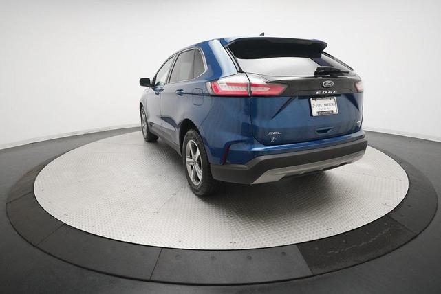 Photo of 2024 Atlas Blue Metallic Ford Edge