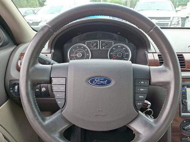 Photo of 2009 Smokestone Metallic Ford Taurus