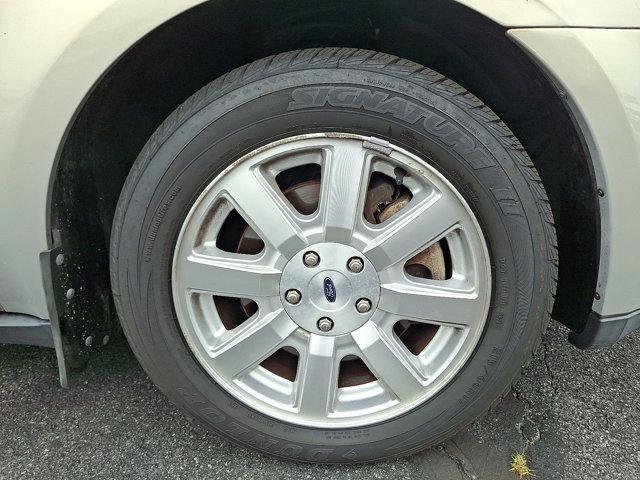 Photo of 2009 Smokestone Metallic Ford Taurus