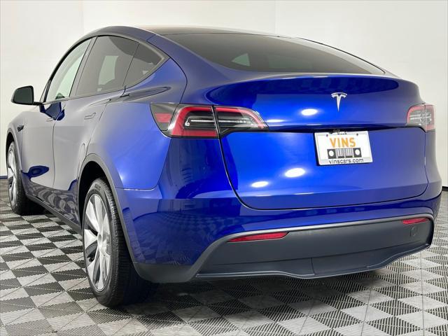 Photo of 2024 Deep Blue Metallic Tesla Model Y