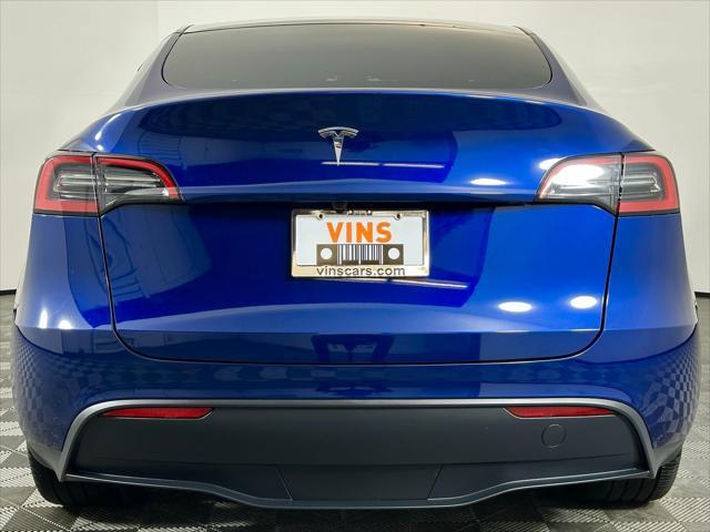 Photo of 2024 Deep Blue Metallic Tesla Model Y