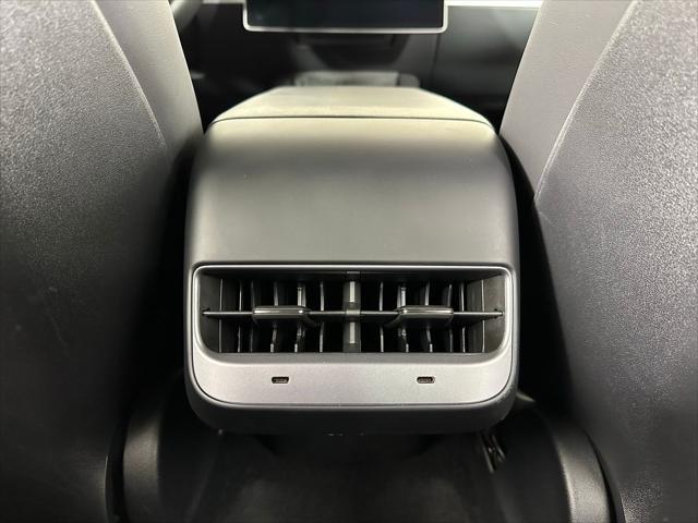 Photo of 2024 Deep Blue Metallic Tesla Model Y