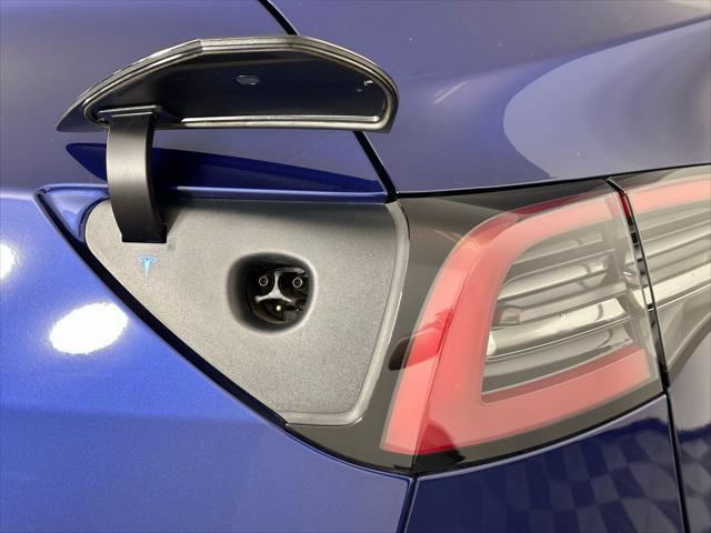 Photo of 2024 Deep Blue Metallic Tesla Model Y