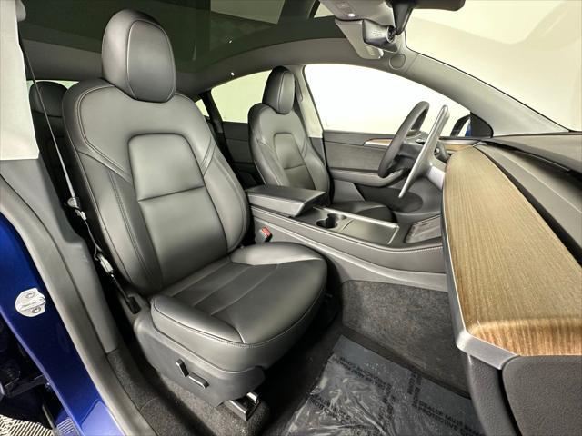 Photo of 2024 Deep Blue Metallic Tesla Model Y