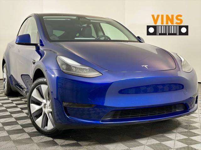 Photo of 2024 Deep Blue Metallic Tesla Model Y