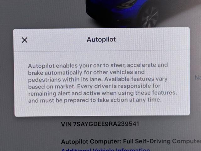 Photo of 2024 Deep Blue Metallic Tesla Model Y