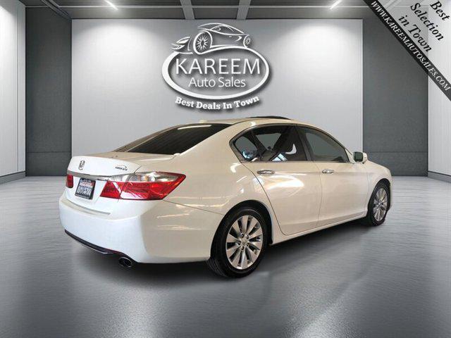 Photo of 2014 White Orchid Pearl Honda Accord