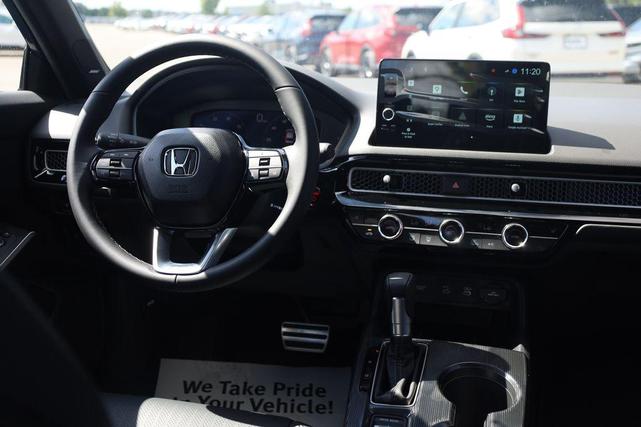 Photo of 2026 Blue Lagoon Honda Civic Hybrid