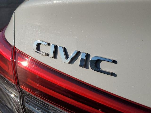 Photo of 2024 Platinum White Pearl Honda Civic