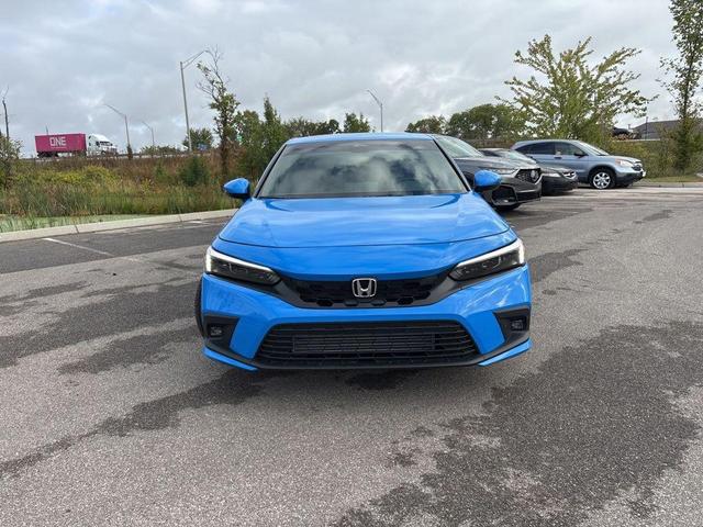 Photo of 2024 Boost Blue Pearl Honda Civic