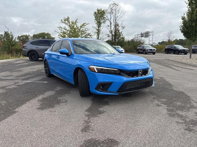 Photo of 2024 Boost Blue Pearl Honda Civic