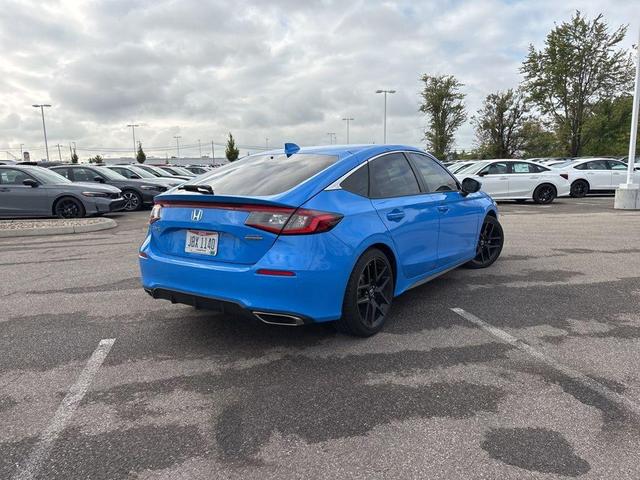 Photo of 2024 Boost Blue Pearl Honda Civic
