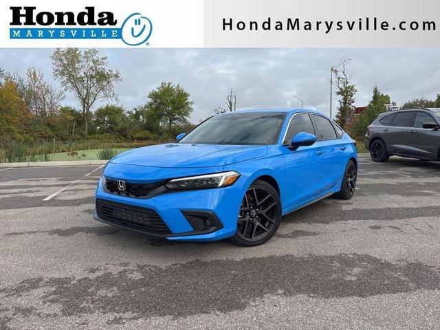 Photo of 2024 Boost Blue Pearl Honda Civic