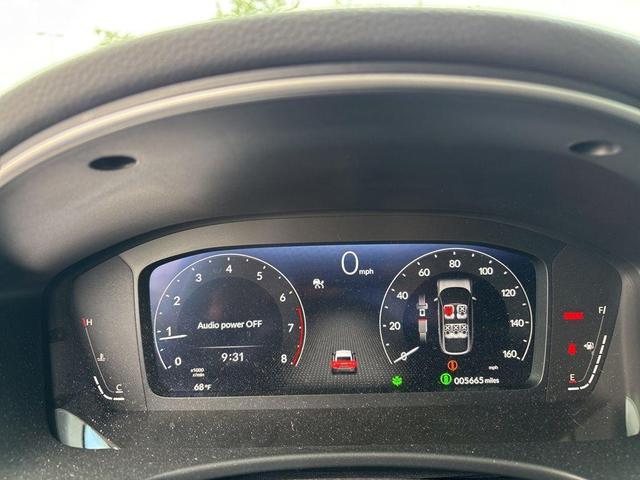 Photo of 2024 Boost Blue Pearl Honda Civic