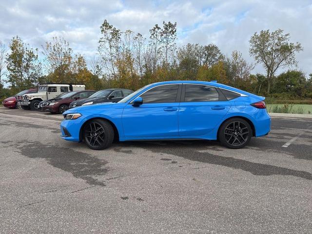 Photo of 2024 Boost Blue Pearl Honda Civic