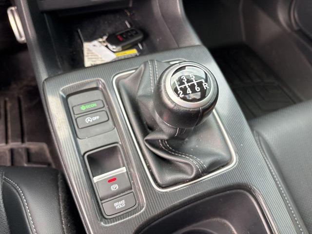 Photo of 2024 Boost Blue Pearl Honda Civic