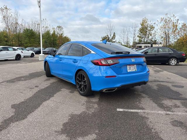 Photo of 2024 Boost Blue Pearl Honda Civic