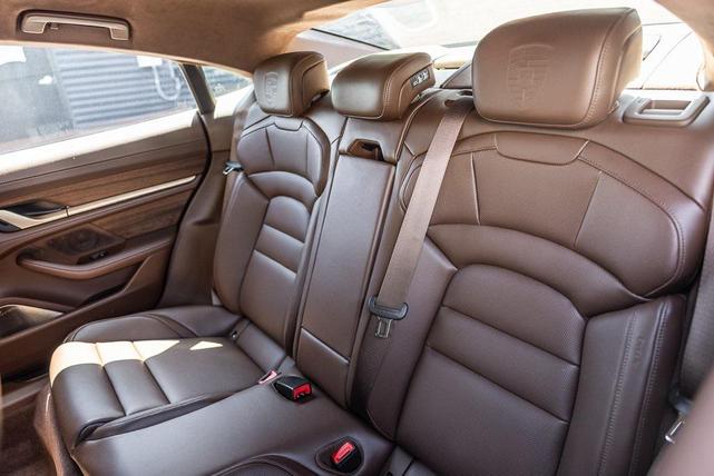 Photo of 2025 Oak Green Metallic Neo Porsche Taycan