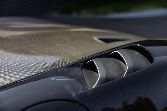 Photo of 2024 Black Porsche 718 Spyder