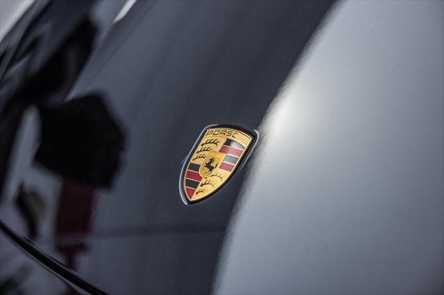 Photo of 2024 Black Metallic Porsche Taycan