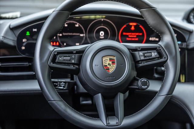 Photo of 2024 Black Metallic Porsche Taycan