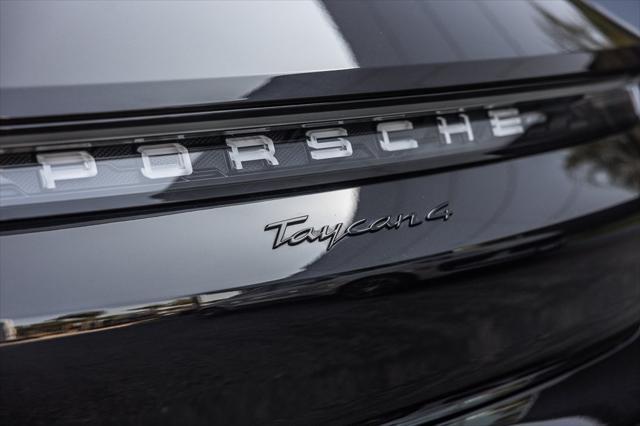 Photo of 2024 Black Metallic Porsche Taycan
