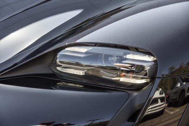Photo of 2024 Black Metallic Porsche Taycan