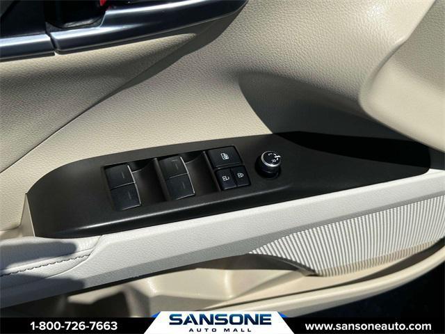 Photo of 2021 Ruby Flare Pearl Toyota Camry Hybrid