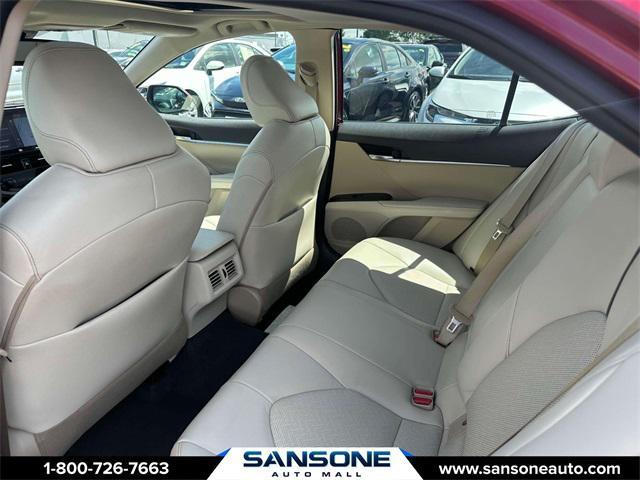 Photo of 2021 Ruby Flare Pearl Toyota Camry Hybrid