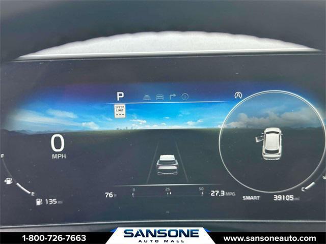 Photo of 2023 Jungle Green/Ebony Black Roof Kia Sportage