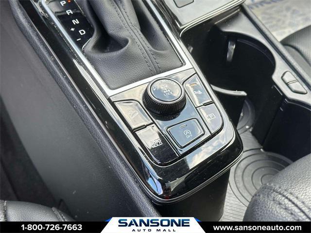 Photo of 2023 Jungle Green/Ebony Black Roof Kia Sportage