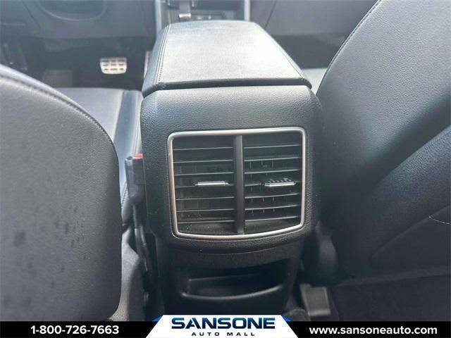 Photo of 2023 Jungle Green/Ebony Black Roof Kia Sportage