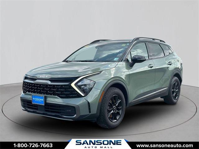 Photo of 2023 Jungle Green/Ebony Black Roof Kia Sportage