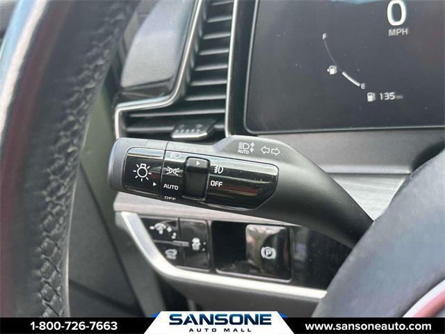 Photo of 2023 Jungle Green/Ebony Black Roof Kia Sportage