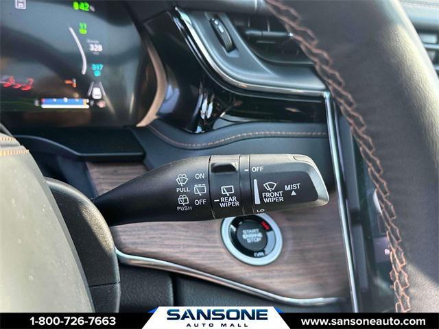 Photo of 2023 Diamond Black Crystal Pearlcoat Jeep Grand Cherokee 4xe