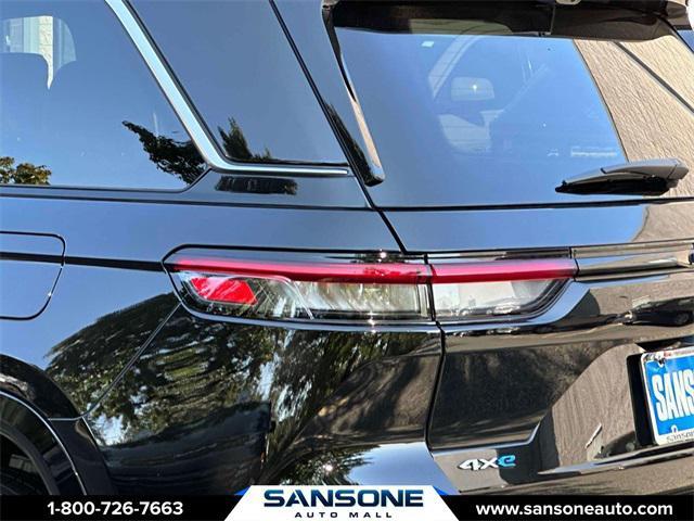 Photo of 2023 Diamond Black Crystal Pearlcoat Jeep Grand Cherokee 4xe