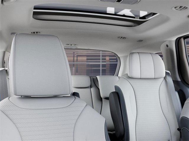 Photo of 2025 Ivory Kia Carnival Hybrid