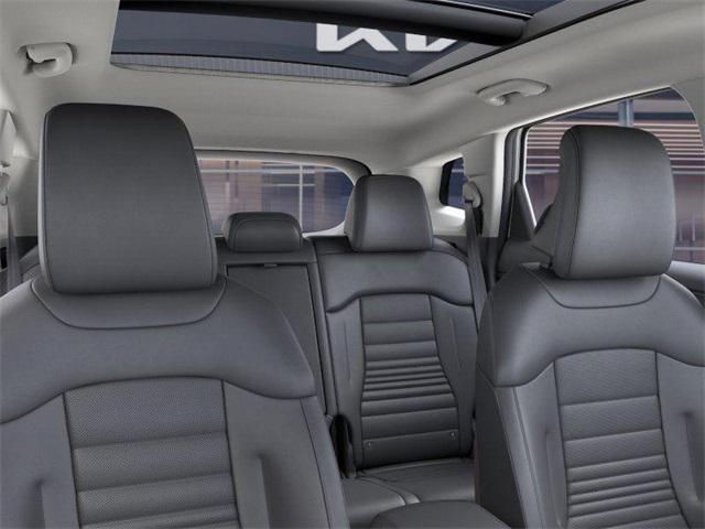 Photo of 2025 White Pearl Kia Sportage Hybrid